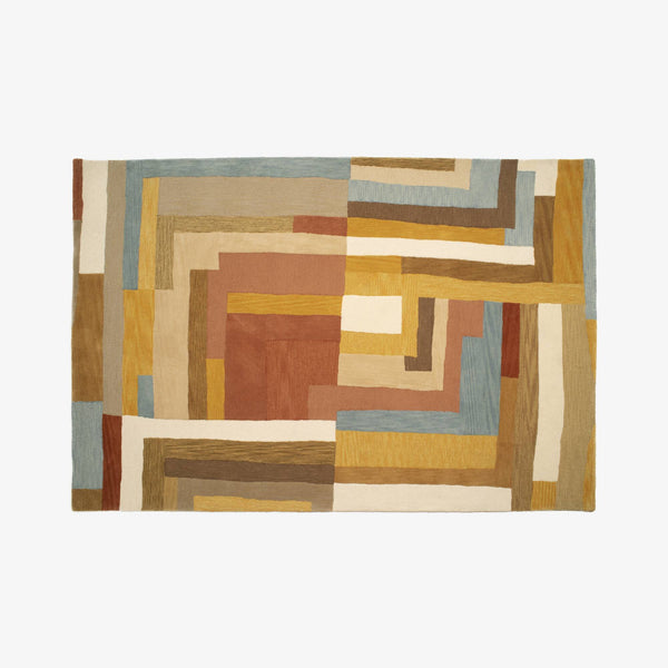 Dywan Labyrinthe — Ligne Roset, wzór geometryczny, kolorystyka złota, terakota i błękitna, widok z przodu