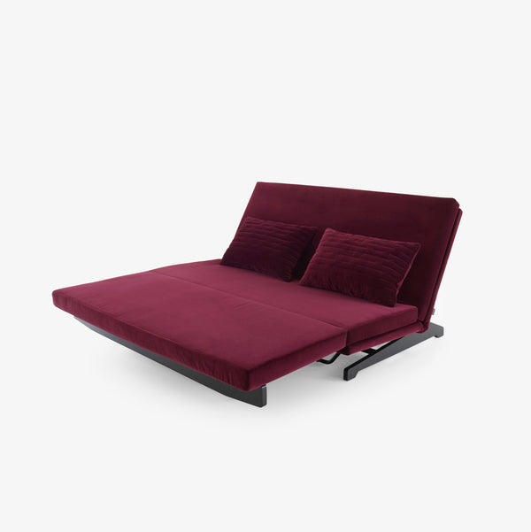 Motus — sofa w pełni rozłożona, tapicerka burgundowa, ujęcie z góry