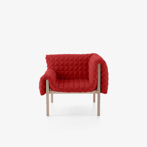 Fotel Ruché lewy — Ligne Roset, tapicerka czerwona pikowana, widok z przodu
