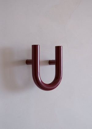 UNE hanger Tamo